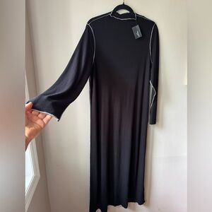 Elegant Black Dress with White Trim